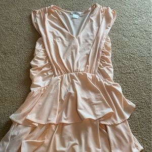 Venus blush top. Flouncy and flowy.